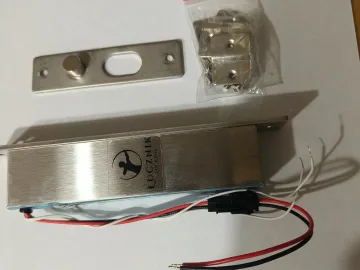 Elektryczny zamek, rygiel drzwiowy , do furtki wejściowej .